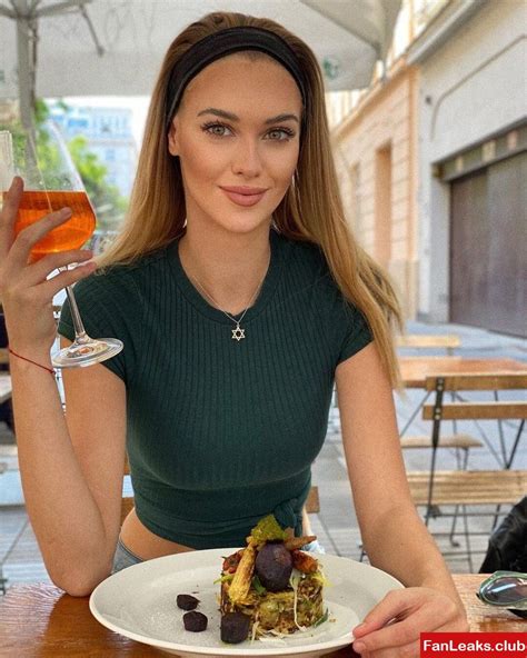 IG@veronikarajek. To celebrate, Veronika Rajek has posted a new video in an orange zipped-up top. The Slovakian model pulls the zipper down, revealing her cleavage and trademark star of David ...